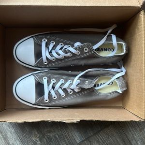 F 
Label as Converse, size ?, low top gray canvas, never worn